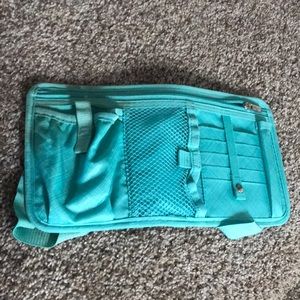 Thirty-one sun visor storage